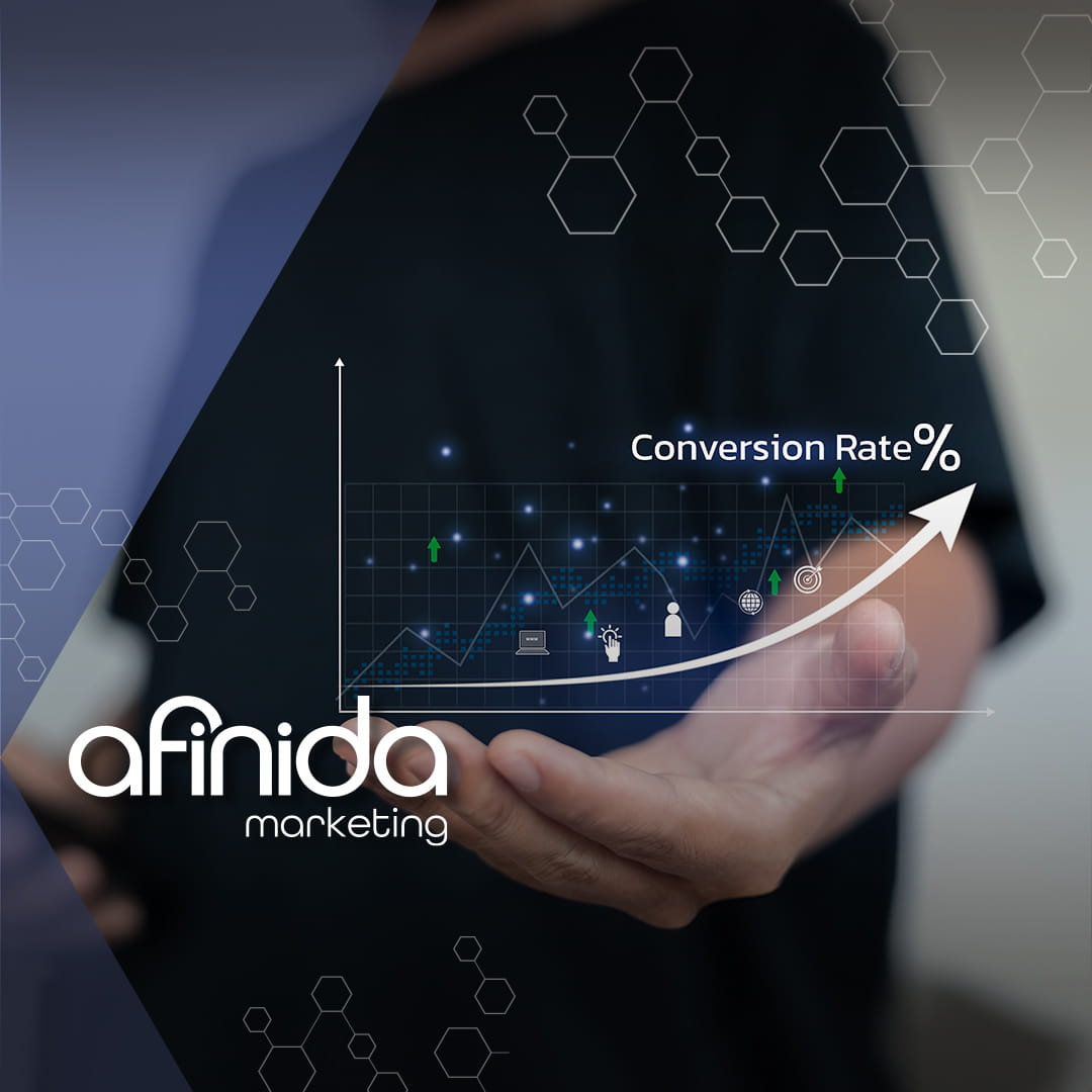 Hand holding a rising digital chart labeled conversion rate optimization, showing increased website conversions and growth for small businesses