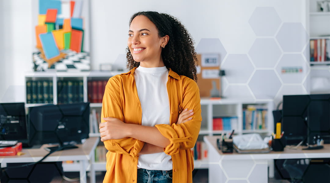 Confident business owner smiling after successful PPC campaign results
